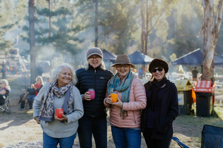 A group of friends enjoy the Clarence Valley Camp Oven Festival