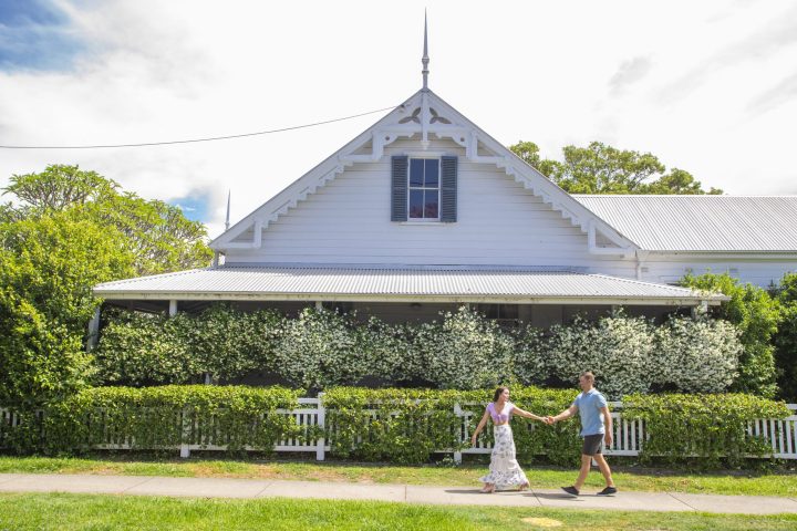 Couple enjoying a walk through the streets of Grafton in Spring.